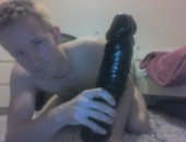 Young blond twink takes huge dildo