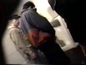 Homeless guy stands around in a public toilet watching people take a piss.  He will also suck a dick for a quarter. 