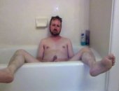 Amateur Daddy turns on the cam in his bathroom to share some of his dirty scat and piss fun from his bath tub.
