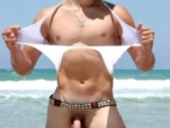 Hot Twink Stripping on the Beach